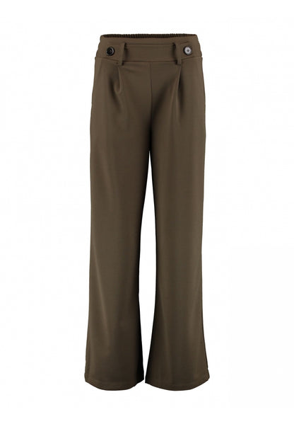 Pantalón ancho con cintura de goma y bolsillos. Dos botones decorativos en la parte delantera. tejido elástico y suave.

Composición: 95% Poliéster y 5% Elastán.

Se recomienda lavar a mano o en lavadora hasta 30º. No usar lejía, planchar suavemente del revés hasta 110º y no usar secadora.