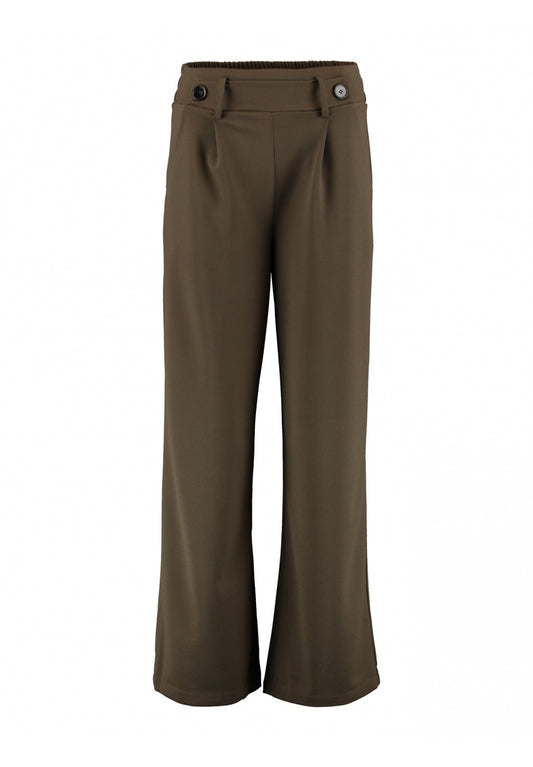 Pantalón ancho con cintura de goma y bolsillos. Dos botones decorativos en la parte delantera. tejido elástico y suave.

Composición: 95% Poliéster y 5% Elastán.

Se recomienda lavar a mano o en lavadora hasta 30º. No usar lejía, planchar suavemente del revés hasta 110º y no usar secadora.