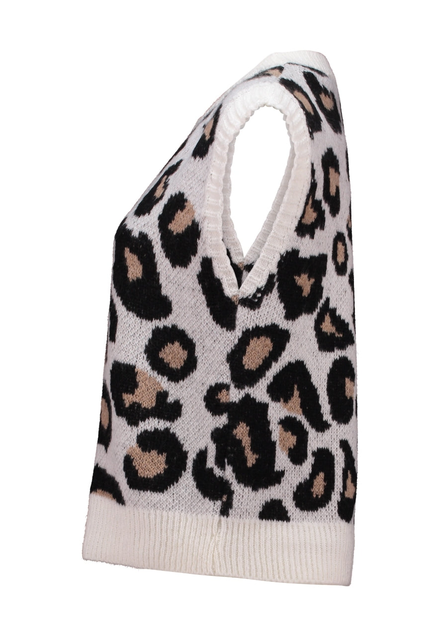 Chaleco estampado animal print.

Composición: 57% Poliacrílico, 29% Poliamida, 7%Lana y 7%Viscosa.

Se recomienda lavar a mano o en lavadora hasta 30º. No usar lejía, planchar suavemente del revés hasta 110º y no usar secadora.