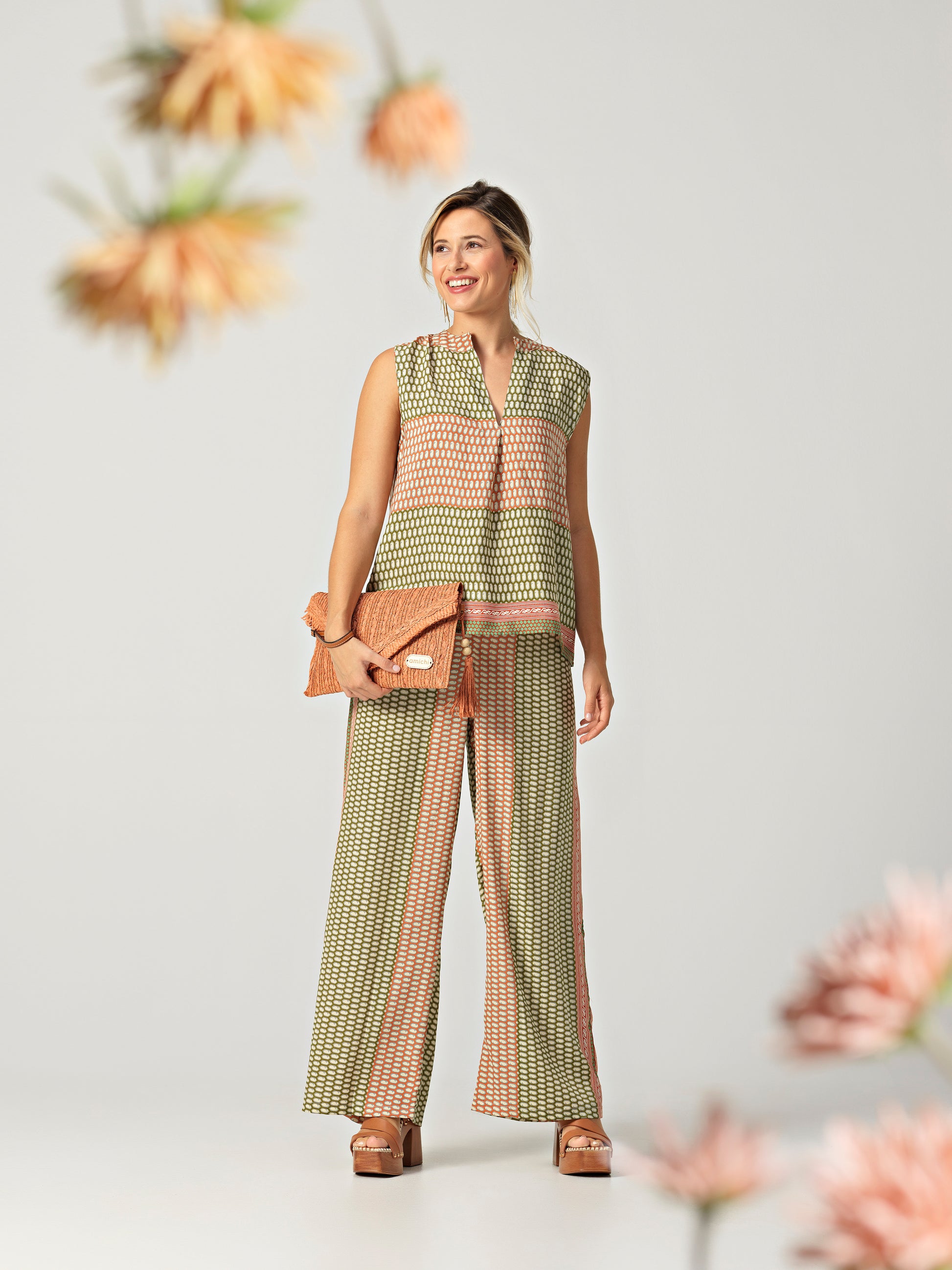 Blusa verde y naranja de la marca amichi, compra amichi online