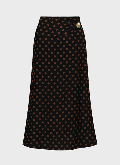 Falda larga estampada, con detalle de aplique en lateral de la cintura, y con goma en parte trasera de la cintura.

Composición: 100% Viscosa.

Se recomienda lavar a mano o en lavadora hasta 30º. No usar lejía, planchar suavemente del revés hasta 110º y no usar secadora.